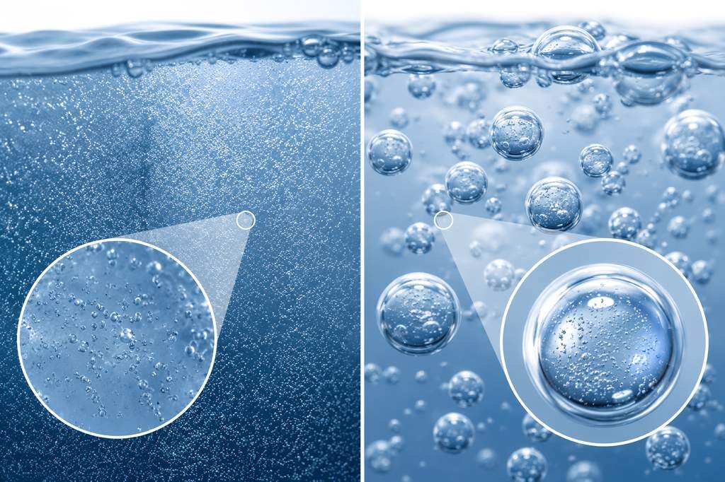 Scientific visualization comparing nitrogen microbubbles (0.1-0.3 µm diameter) versus CO2 carbonation bubbles (0.5-5 mm diameter) in beverages — illustrating the fundamental physics that explains why nitrogen produces velvety smooth mouthfeel while CO2 produces sharp carbonation prickle, with direct implications for flavor perception differences.